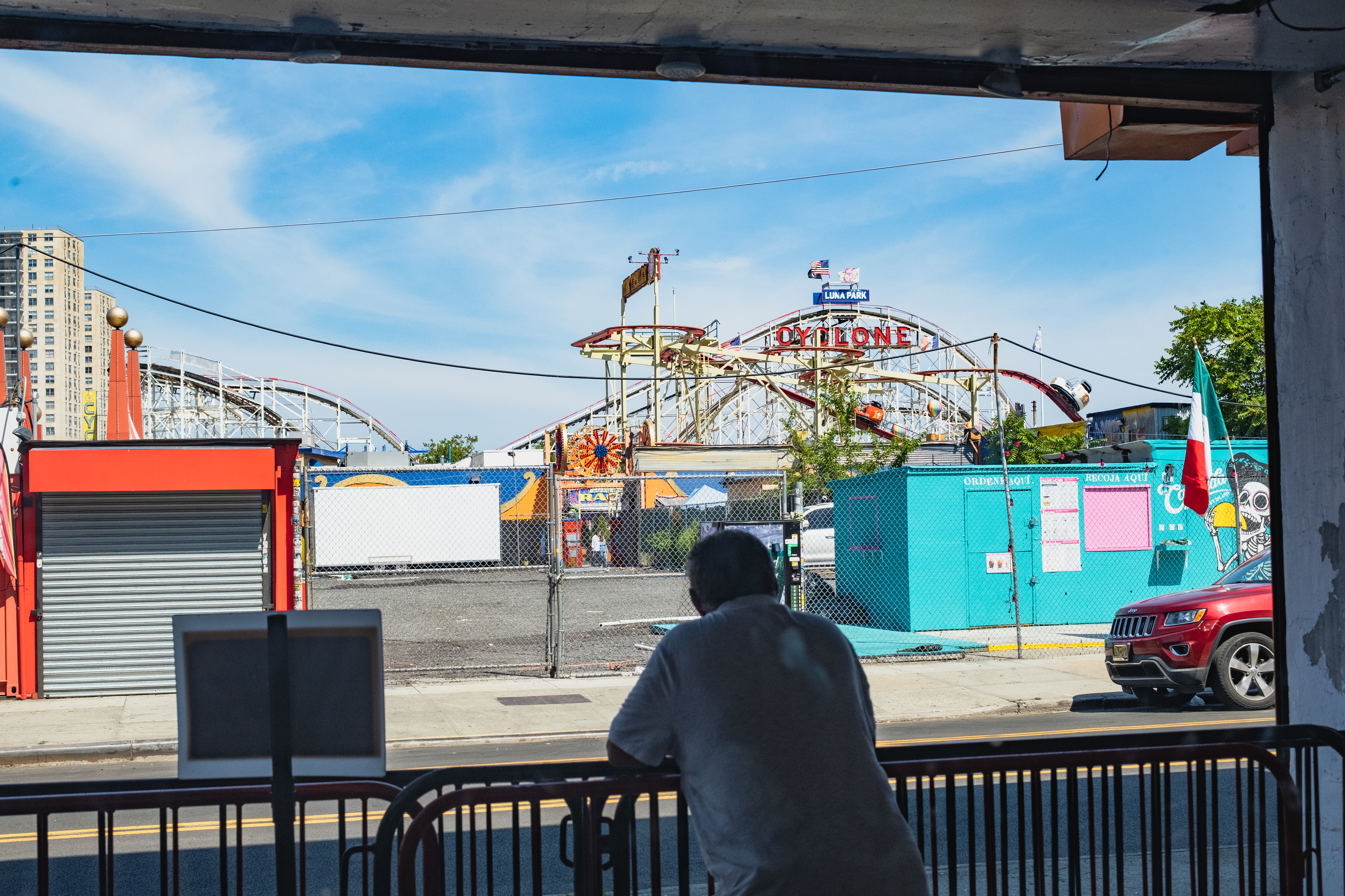 Coney Island performers waving goodbye on the boardwalk